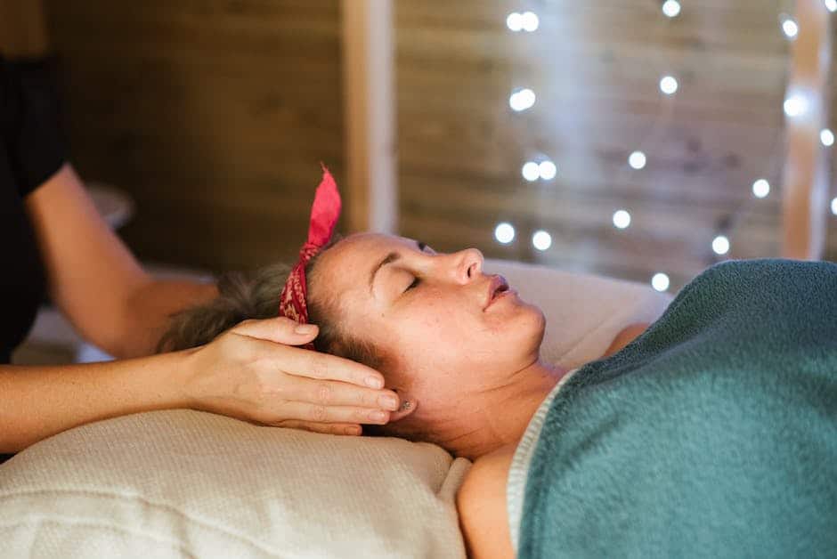 A person receiving Reiki energy with their eyes closed, experiencing a sense of calm and relaxation